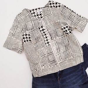 CABI patchwork houndstooth design emboldens this clean-cut short sleeve jacket